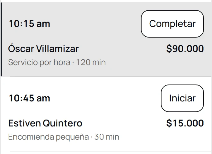 Agenda de reservas de De Una con datos de demostración: cada viaje con su hora, el nombre del cliente y el servicio.